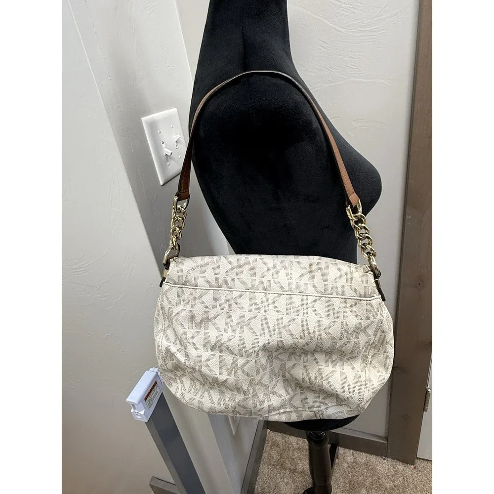 Michael Kors White Jet Set Item Signature Medium Tassel Flip Top Shoulder Bag